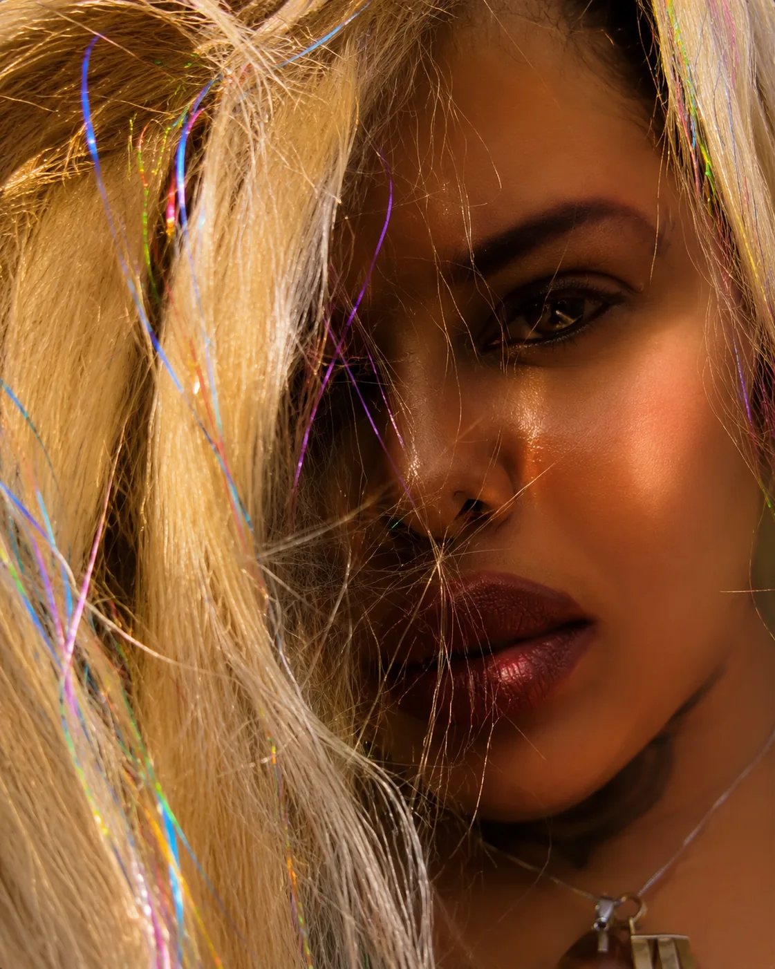 SheisL1 portrait with blonde hair and iridescent fairy strands